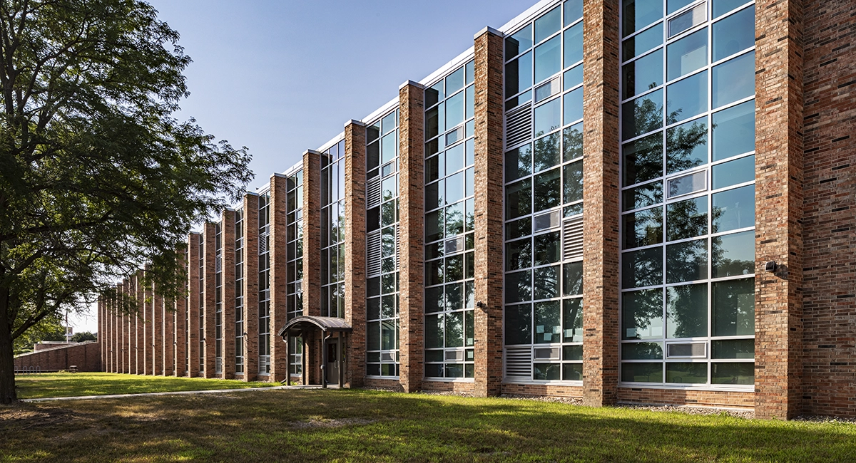 Renovated West High School: New windows, improved energy efficiency, enhanced aesthetics.