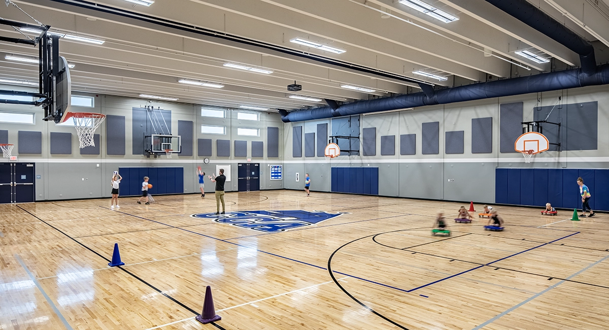 school gymnasium with children playing