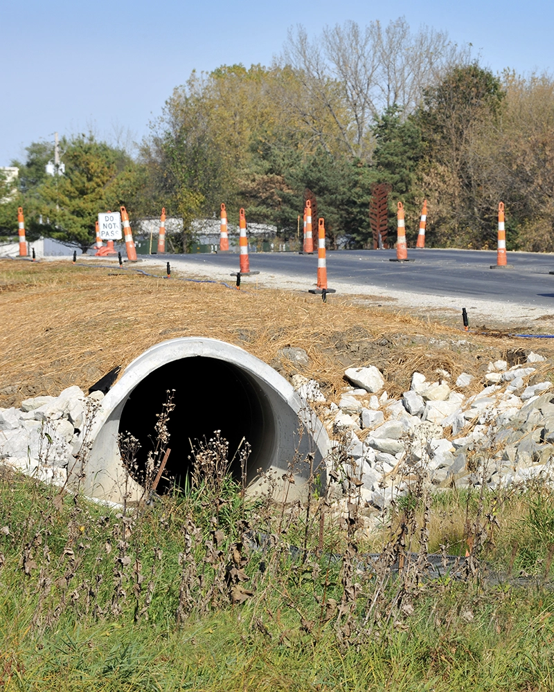 Sewer pipe next to road