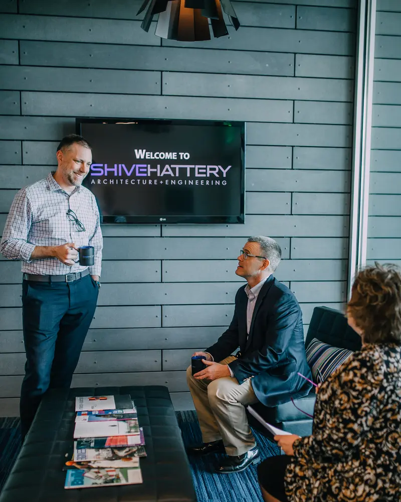 Three people collaborating in an office