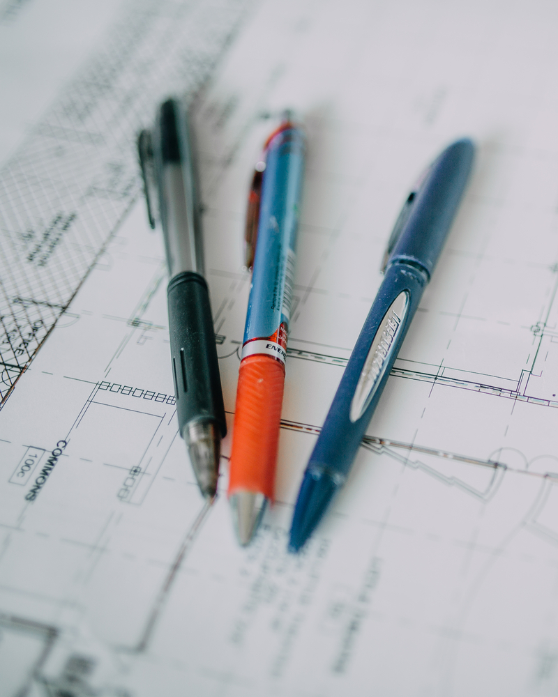Pens on design plans