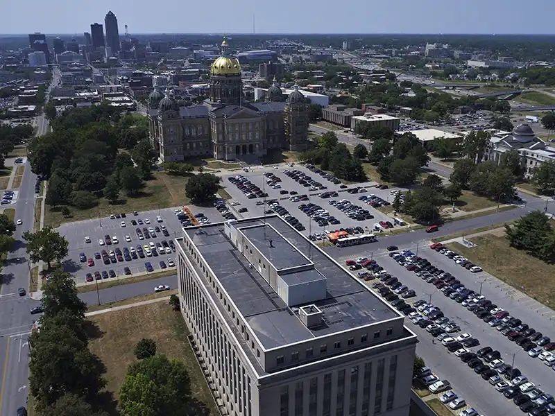 An aerial view of a metro area with an ornate domed capitol building