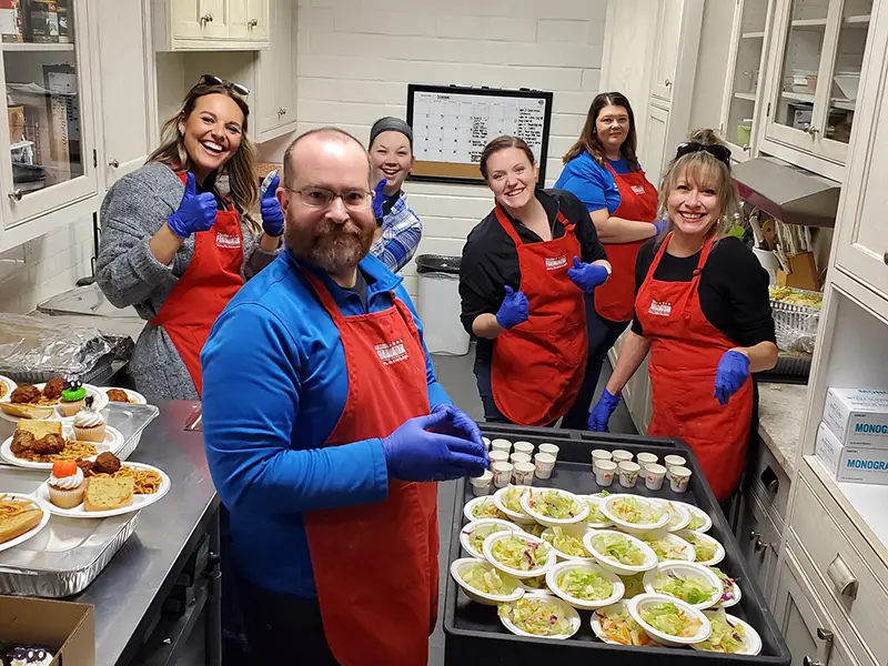 Group volunteering at food bank
