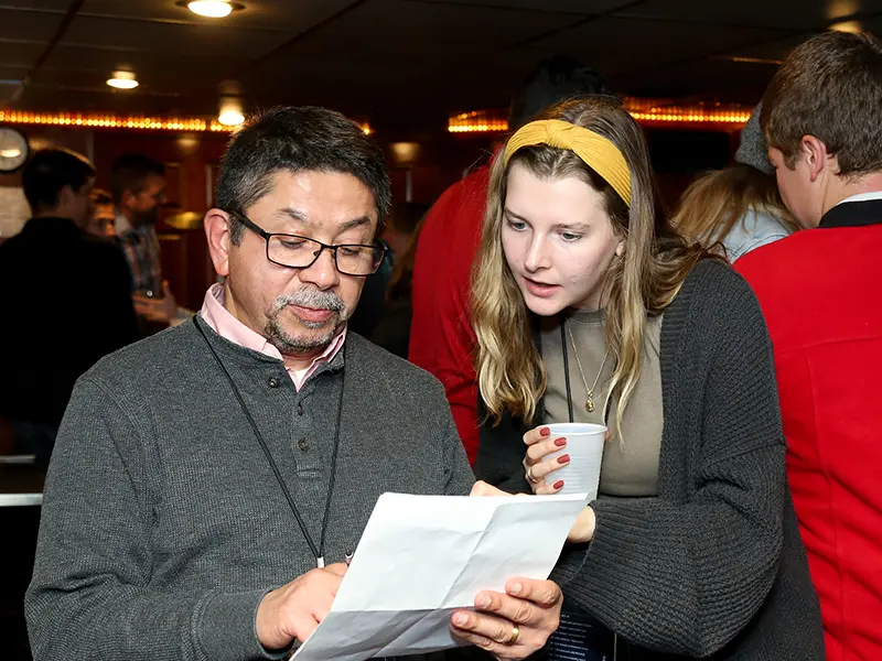 Two people playing an Ice breaker game at Civil Swarm