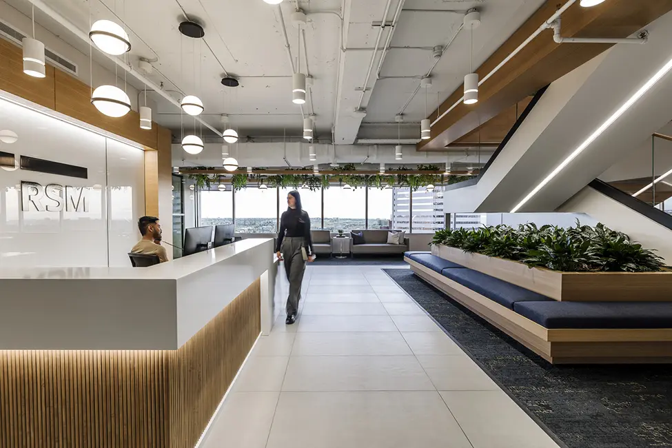 Seating Area with Plants, stairway, front desk