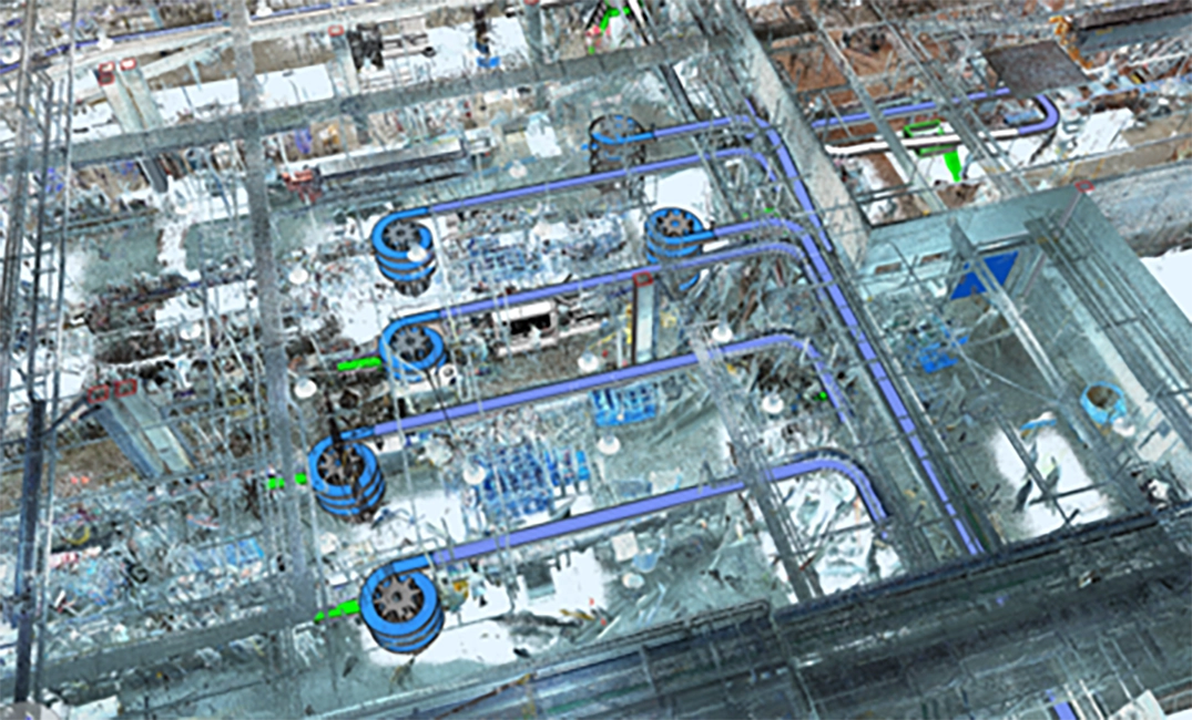 A 3D point‑cloud scan of an industrial facility with blue modeled piping overlaid for coordination.